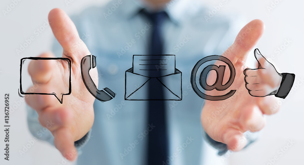 Businessman holding manuscript contact icon in his hand