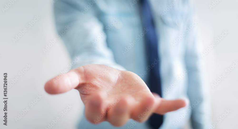 Businessman showing his empty hand