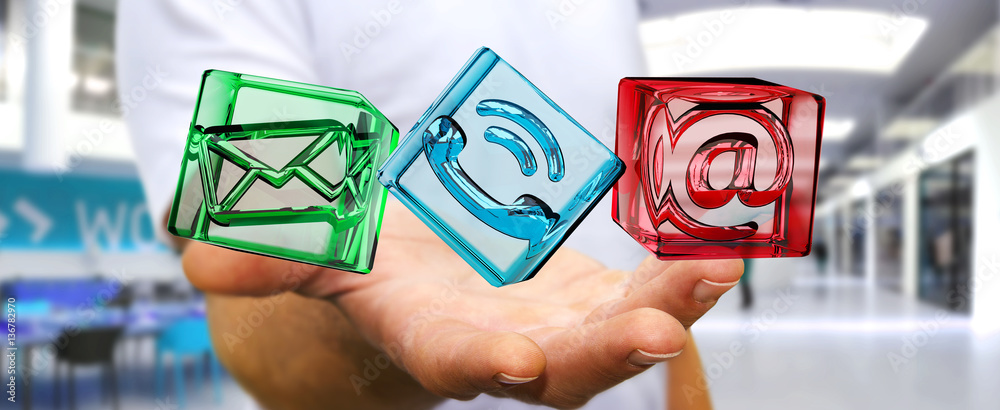 Businessman holding transparent cube contact icon in his hand 3D