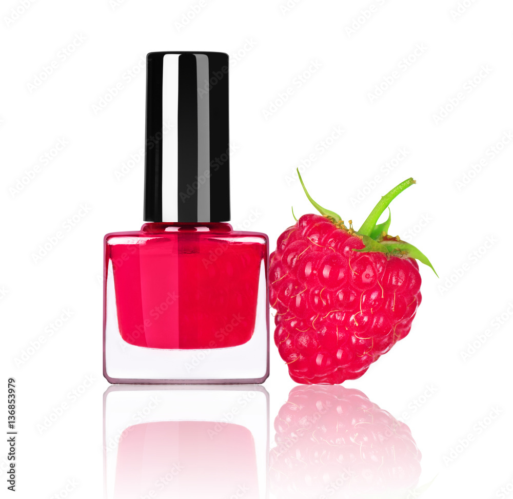 bright nail polish with raspberry isolated on white background