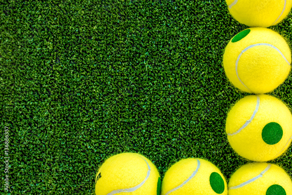 tennis ball on green background top view mock up