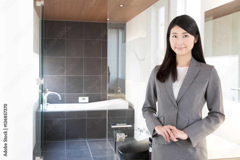 asian businesswoman showing bathroom