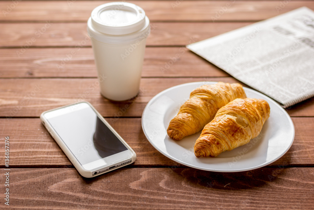 Businessman morning coffee at home with newspaper