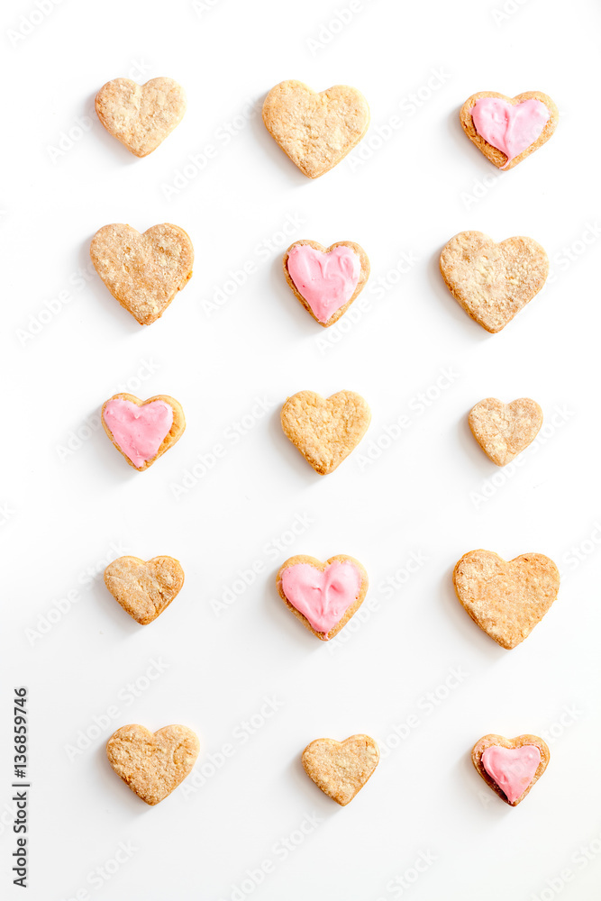 cookies for Valentine Day heartshaped white background top view pattern