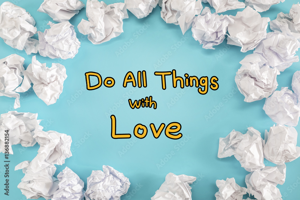 Do All Things With Love text with crumpled paper balls