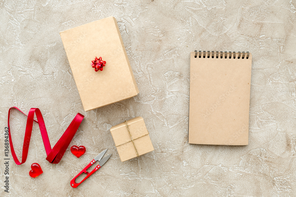 wrapping gifts in box for holiday top view mock up