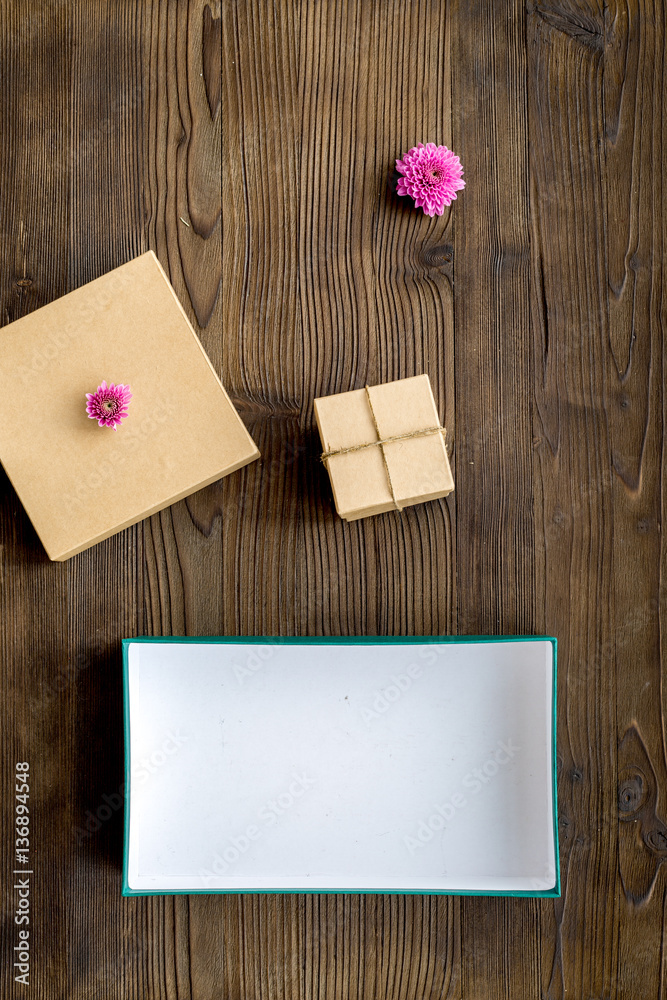 wrapping gifts in box for holiday top view mock up