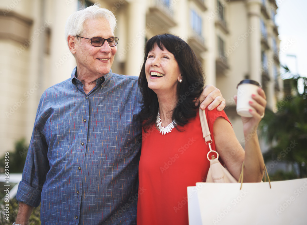 Mature couple enjoying shopping around