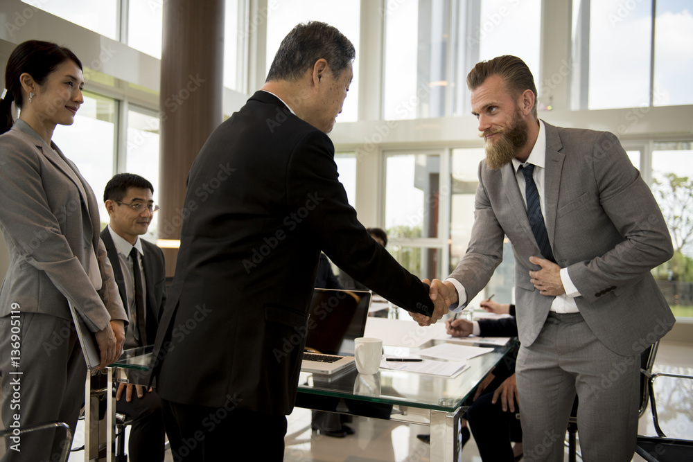 Business Partners Introductionary Handshake Bow