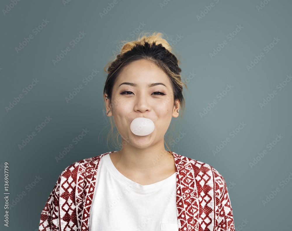 Young Girl Chewing Bubble Gum Concept