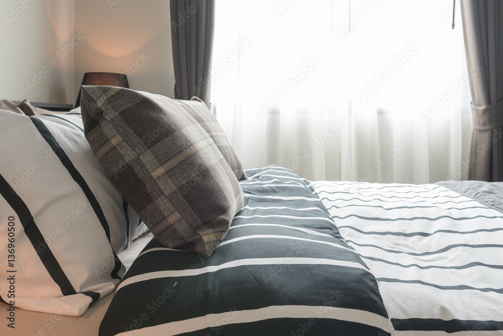 modern bedroom design with black and white blanket