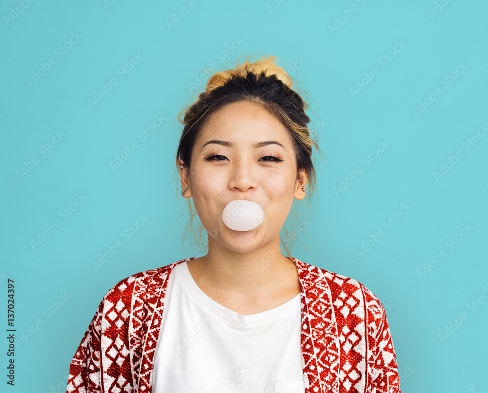 Young Girl Chewing Bubble Gum Concept