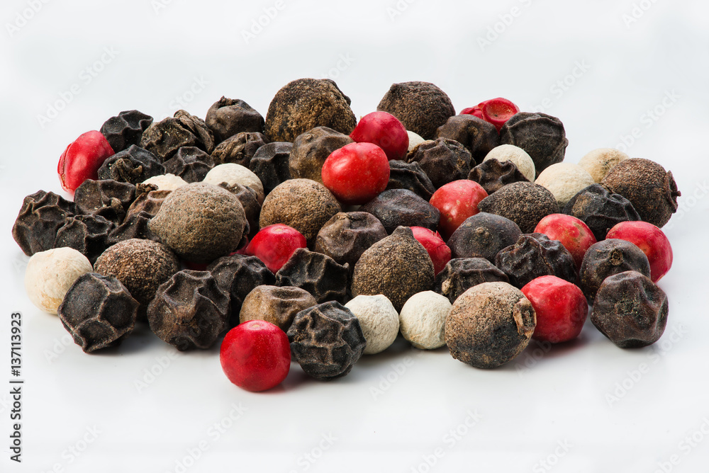 Mix of different peppers balls isolated on white background. Macro. Close up. Perfect quality.