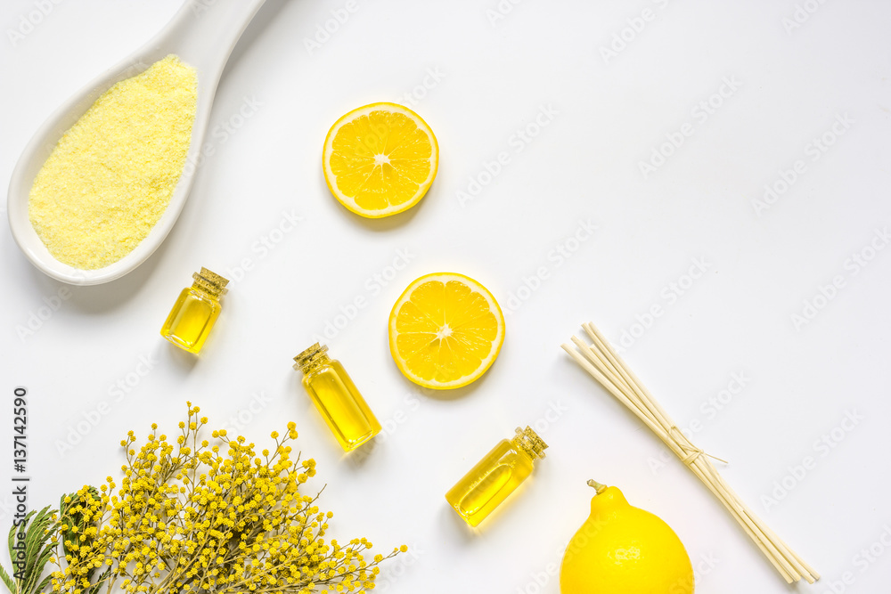 Natural cosmetic seasalt and oil on white background top view mock up