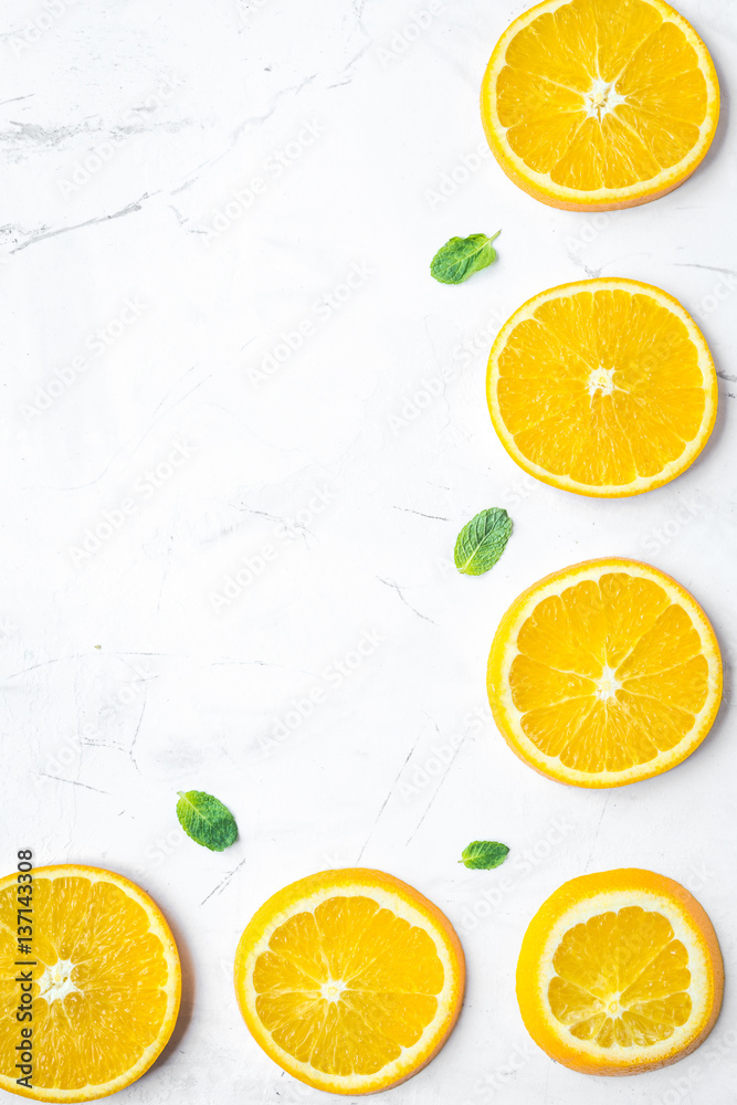 Slices for orange juice on white background top view mock-up