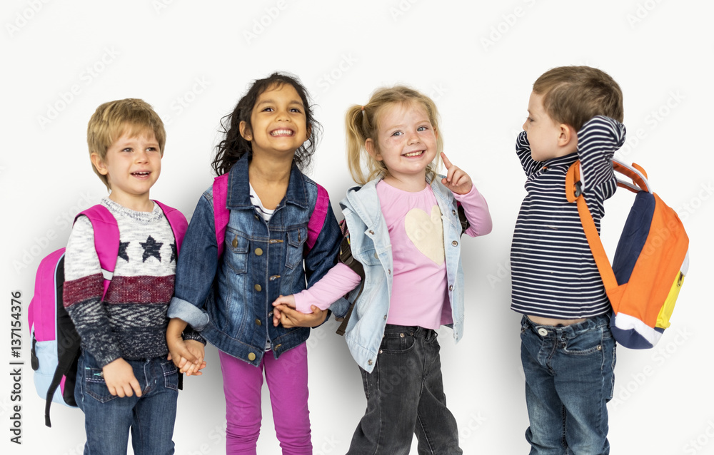 Little Kids Holding Hands Carrying Backpacks