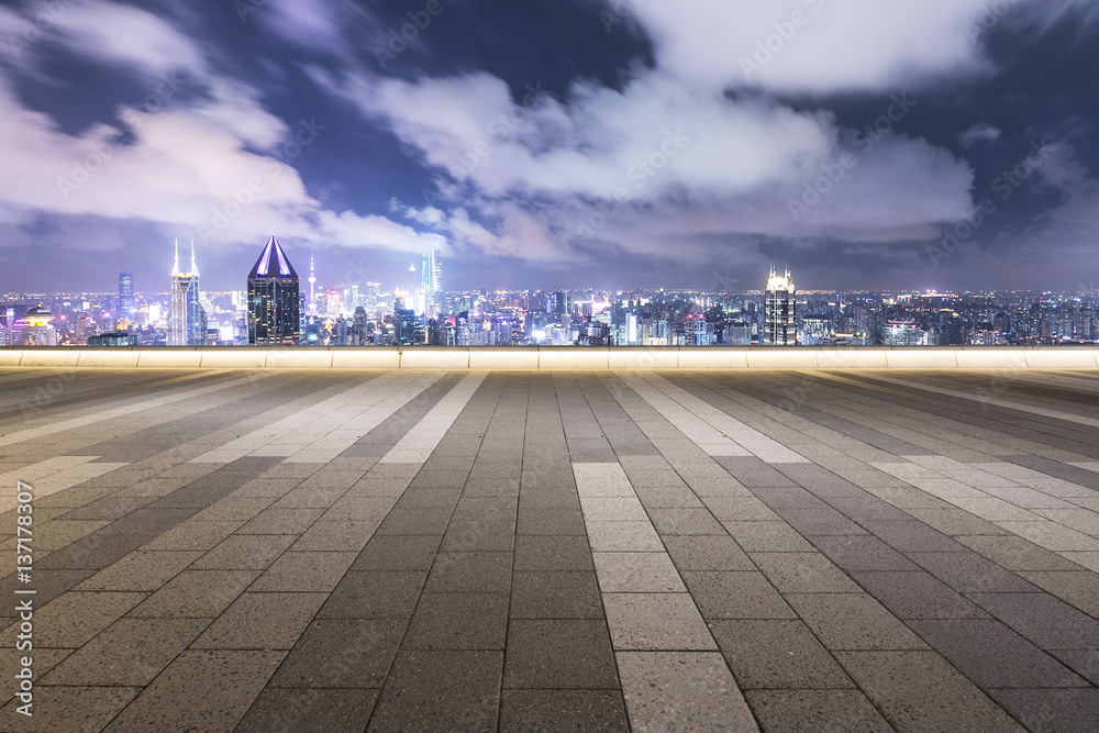 cityscape and skyline of shanghai from empty tile floor