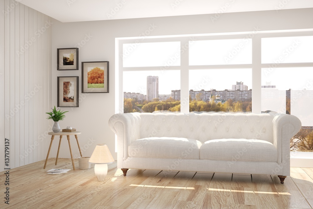 White room with sofa and urban landscape in window. Scandinavian interior design