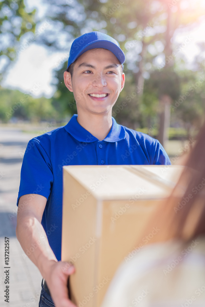 deliveryman stand and smile