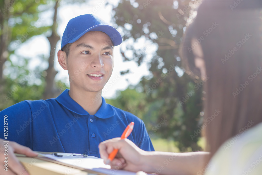 deliveryman stand and smile