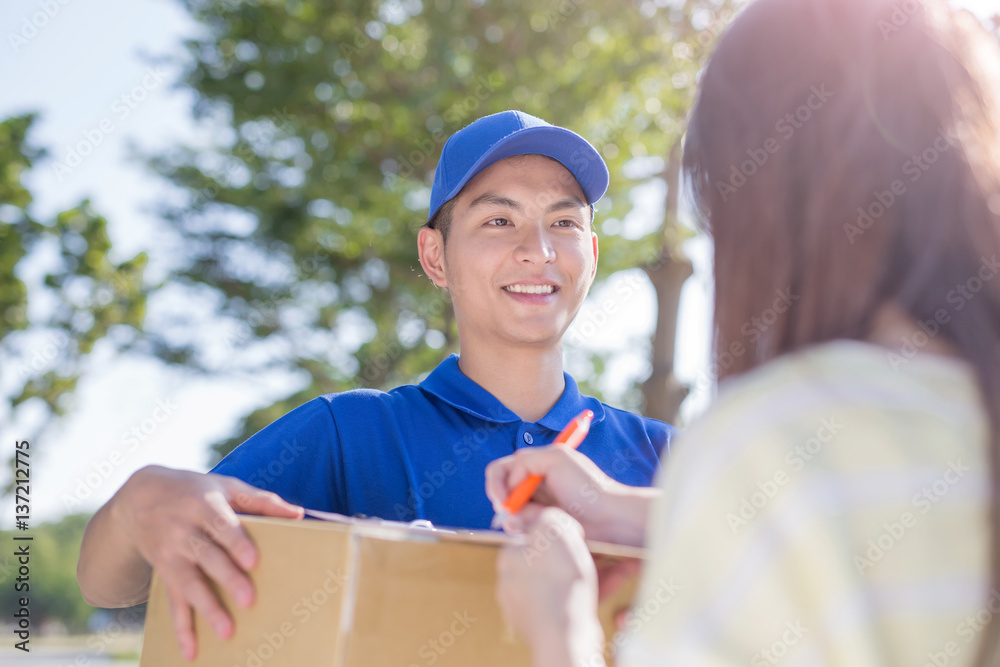 deliveryman stand and smile