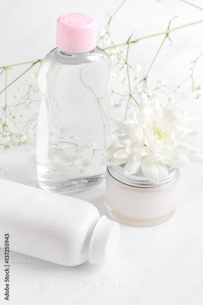 natural organic cosmetics with herbs for baby on white background