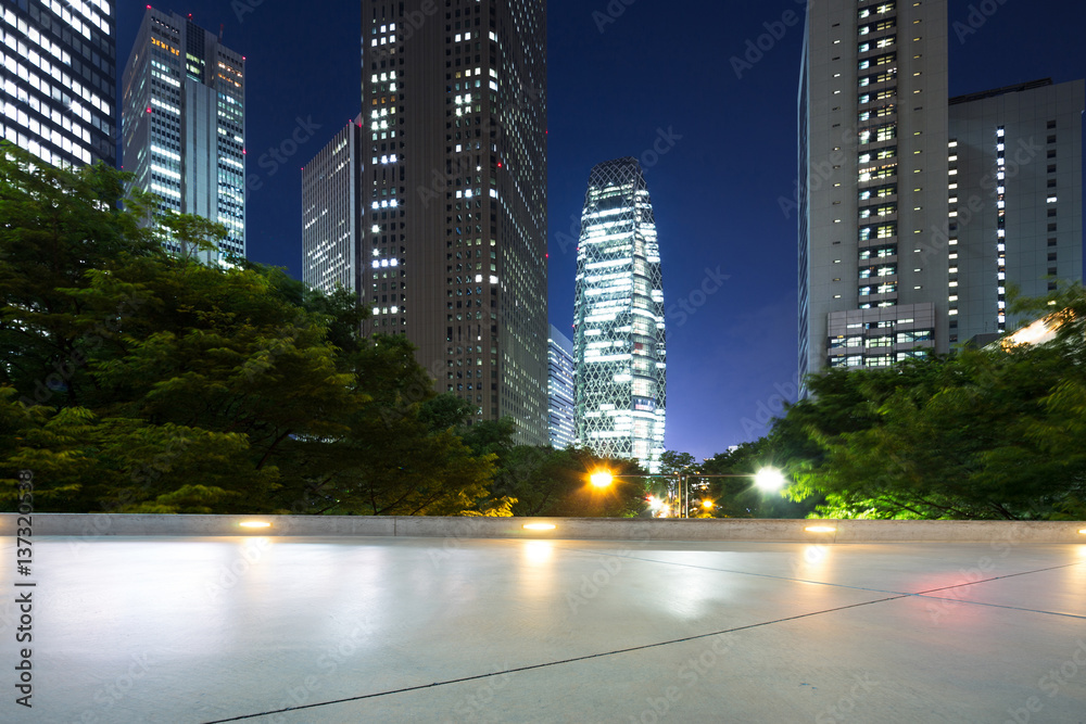 empty floor and modern buildings in tokyo