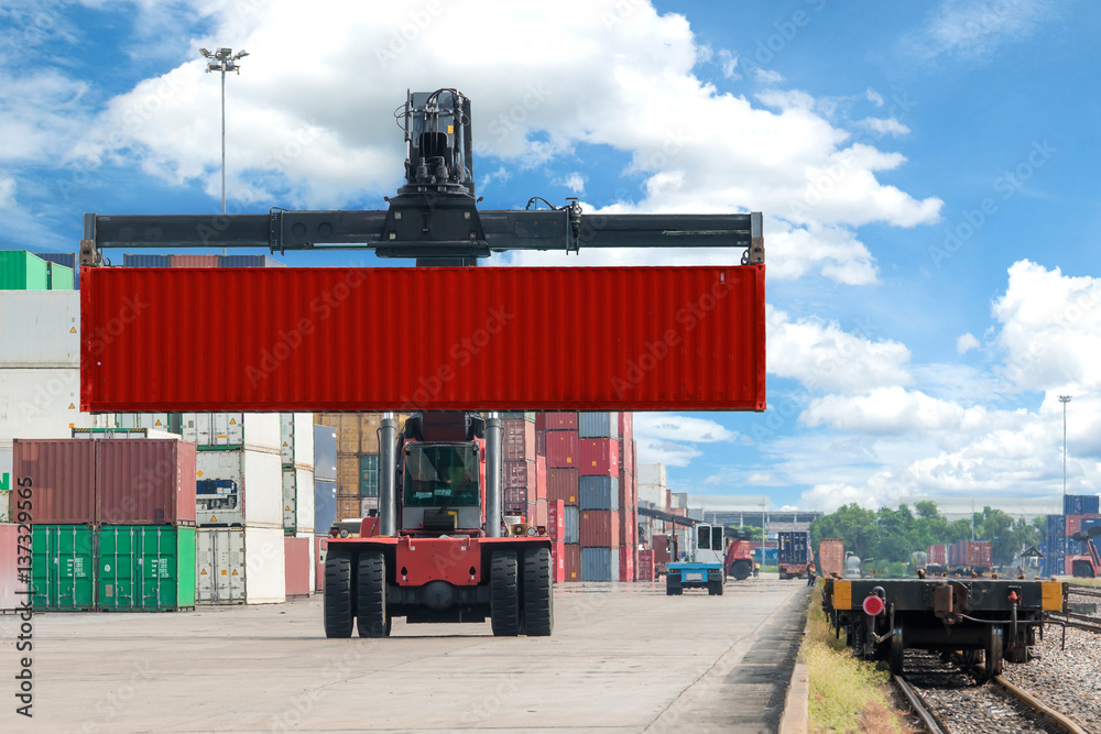 forklift handling container box loading to freight train