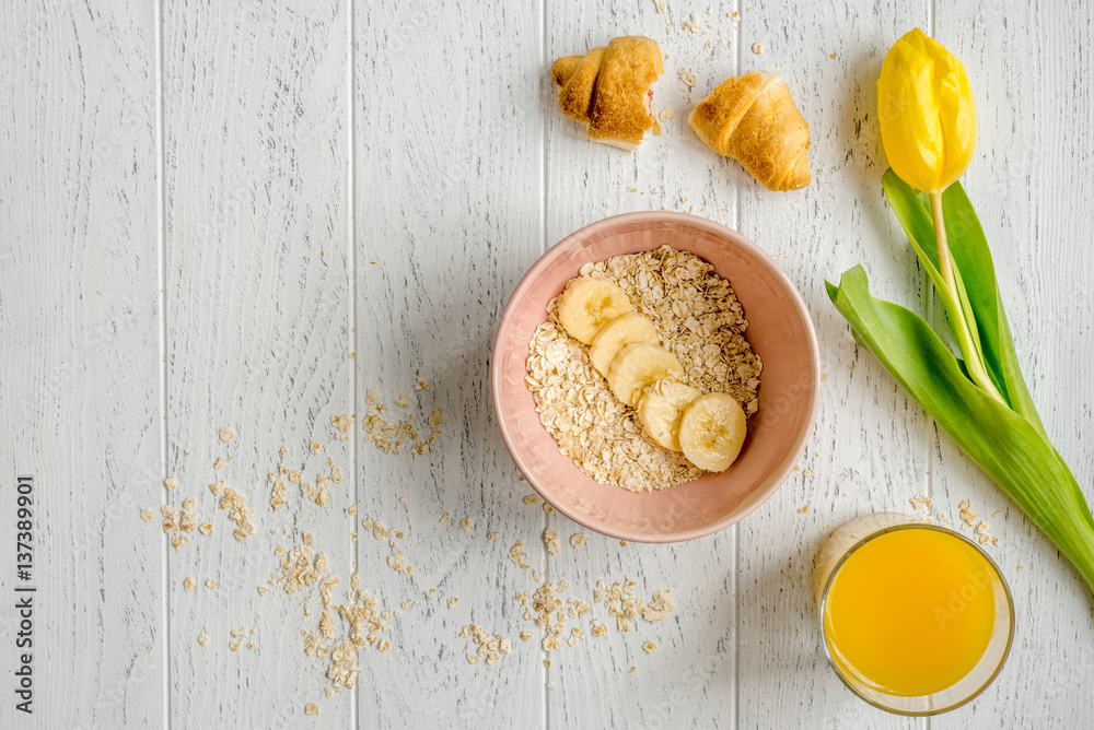 healthy breakfast with porridge on wooden background top view mockup