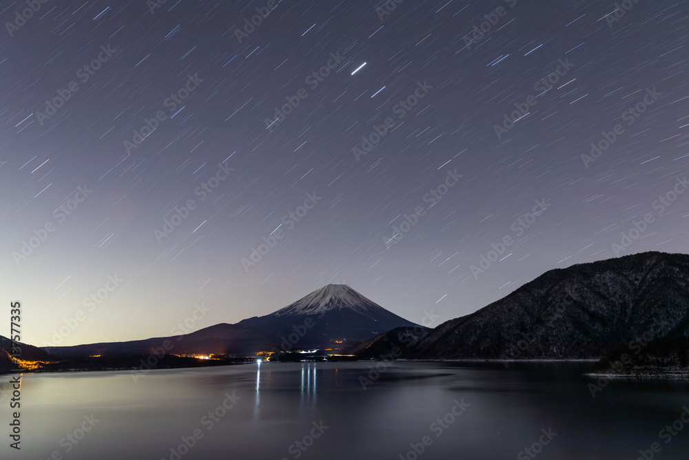 Lake Motosu and mt.Fuji at night time in winter season. Lake Motosu is the westernmost of the Fuji F