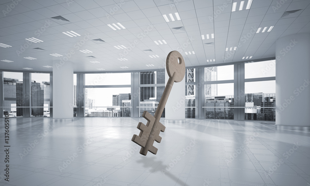 Conceptual background image of concrete key sign in modern office interior