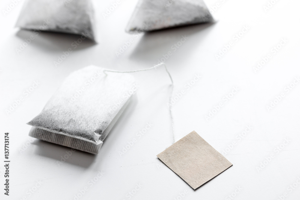 Tea in teabags on white table mock up