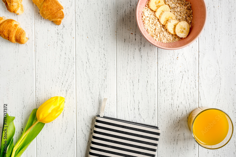 healthy breakfast with porridge on wooden background top view