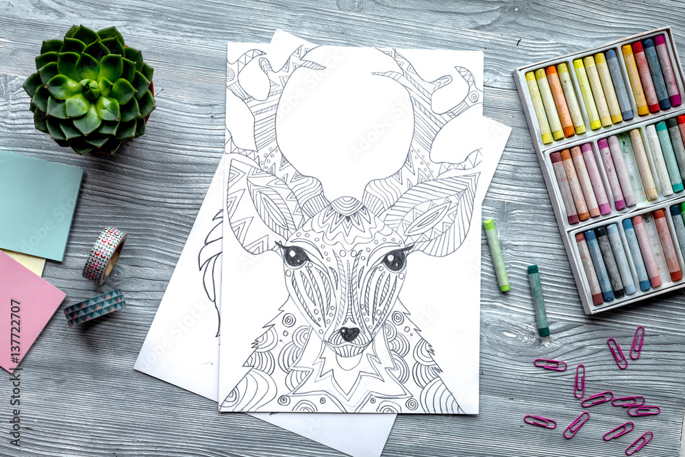 coloring picture for adults on wooden background top view