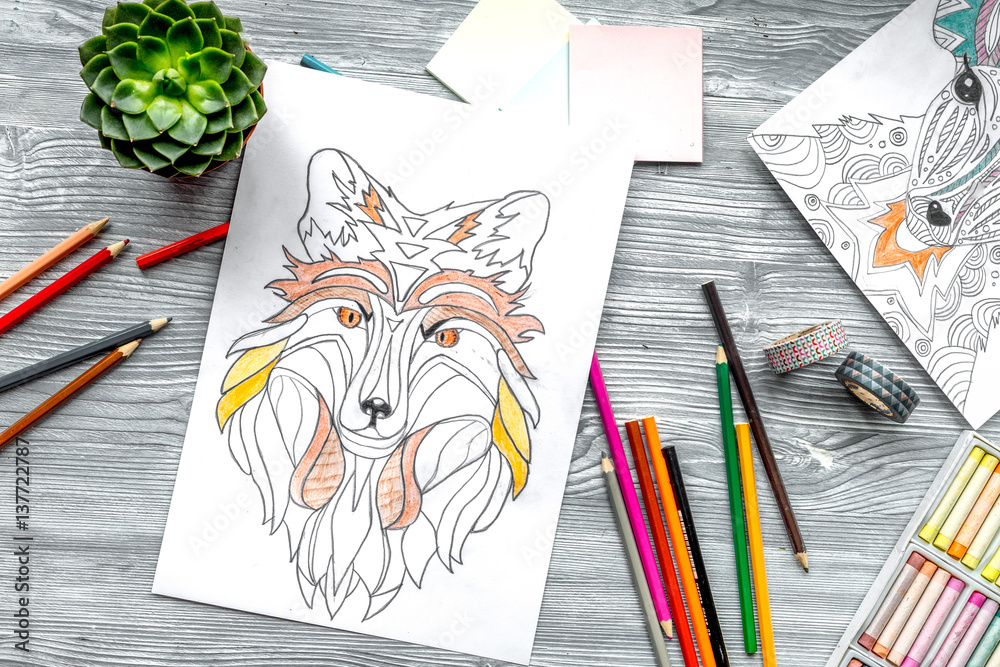 coloring picture for adults on wooden background top view