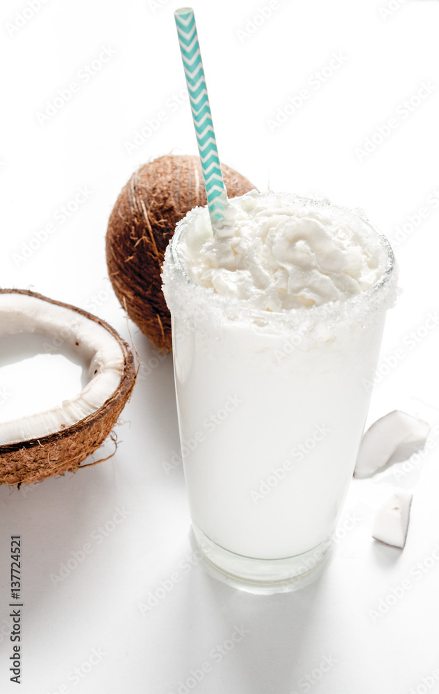 cocktail with coconut on white background