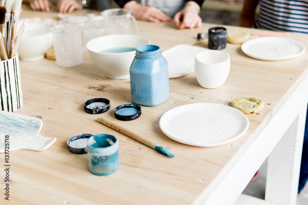 workshop production of ceramic tableware product painting