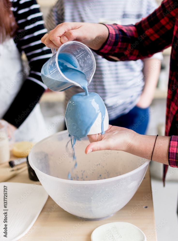 workshop production of ceramic tableware product painting