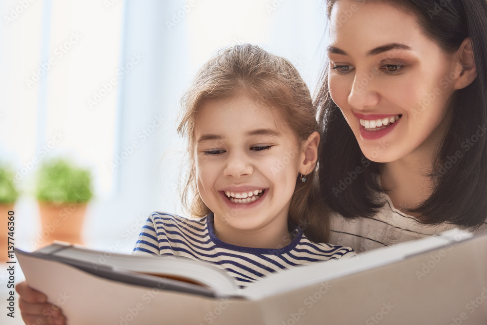 Mom and child reading a book