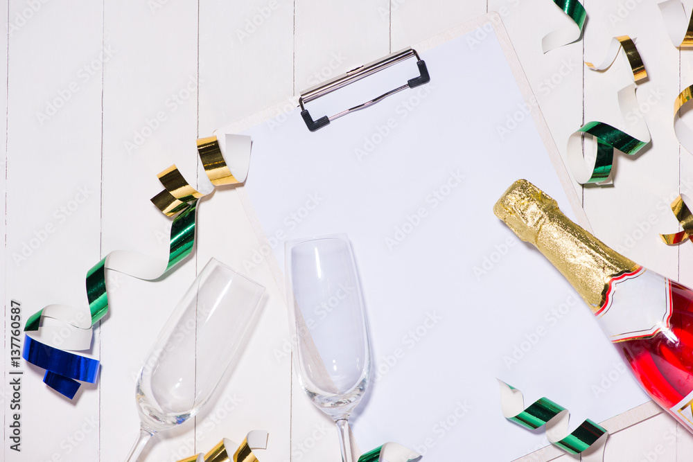 Celebration Flat lay. Champagne bottle with copyspace on wooden background