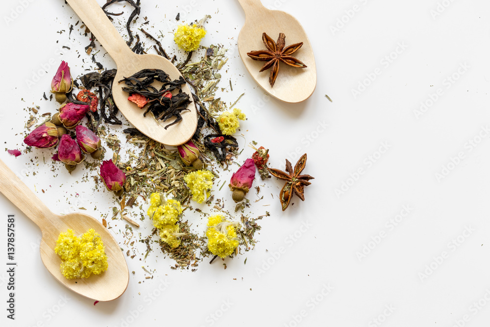 Herbs in spoons on white background top view mock up