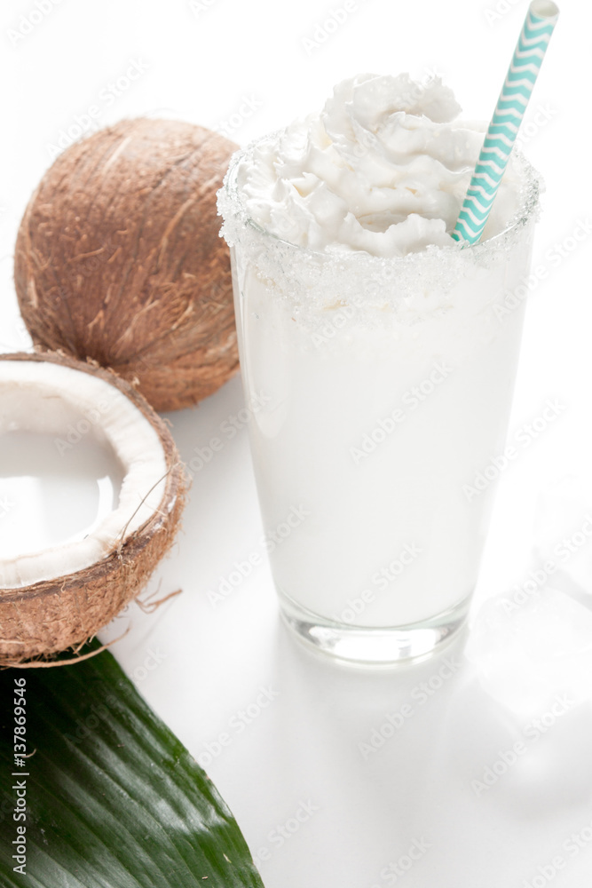 cocktail with coconut on white background