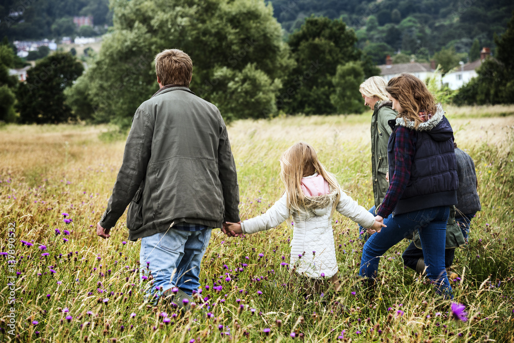 Family Walking Field Nature Togetherness Concept