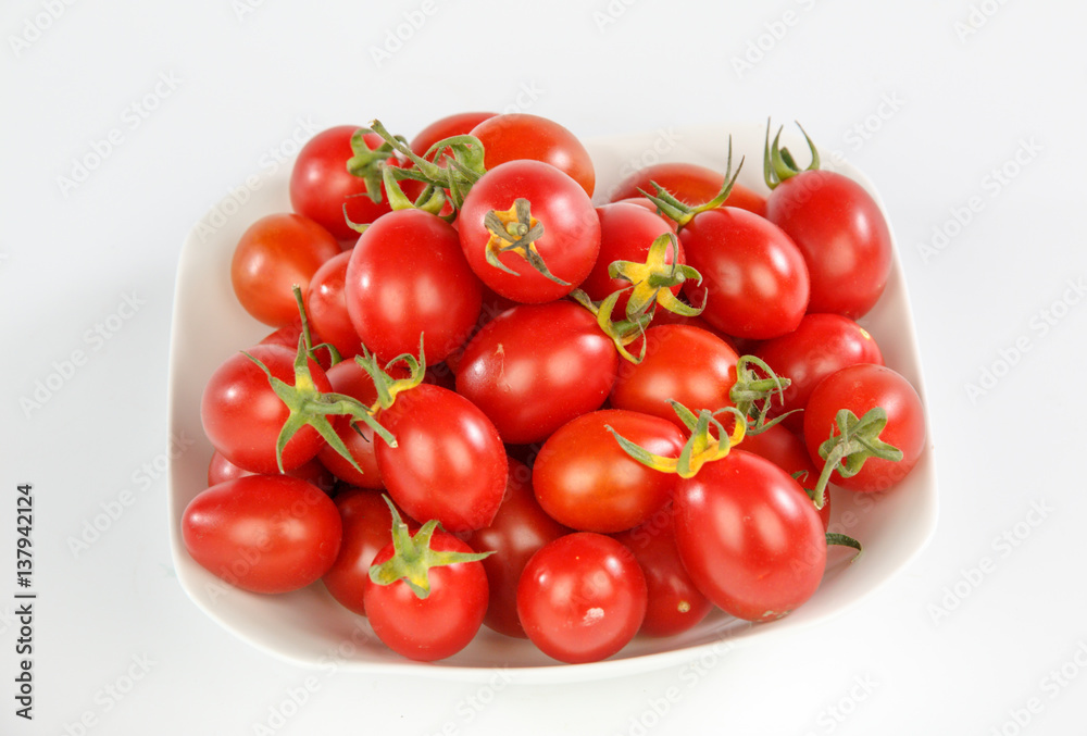 tomatoes on a white plate