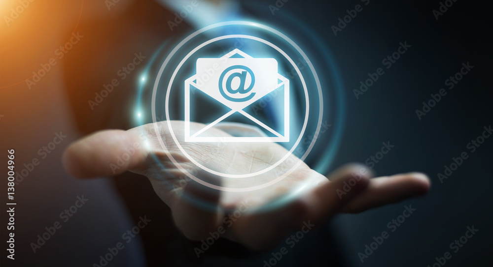 Businessman holding 3D rendering flying email icon in his hand