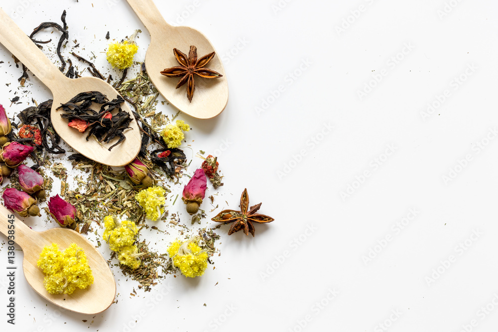 Herbs in spoons on white background top view mock up