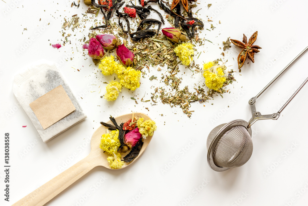 Herbs in spoons on white background top view mock up