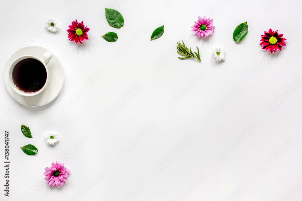 Cup of americano and flowers on white table top view mock-up