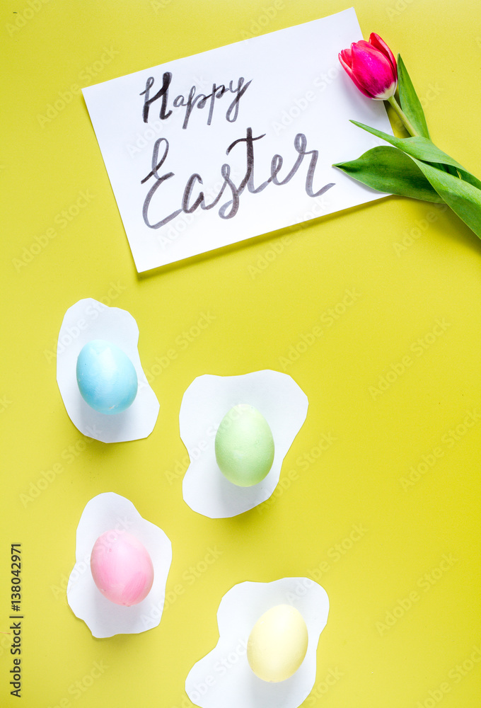 Easter concept on yellow background top view mockup