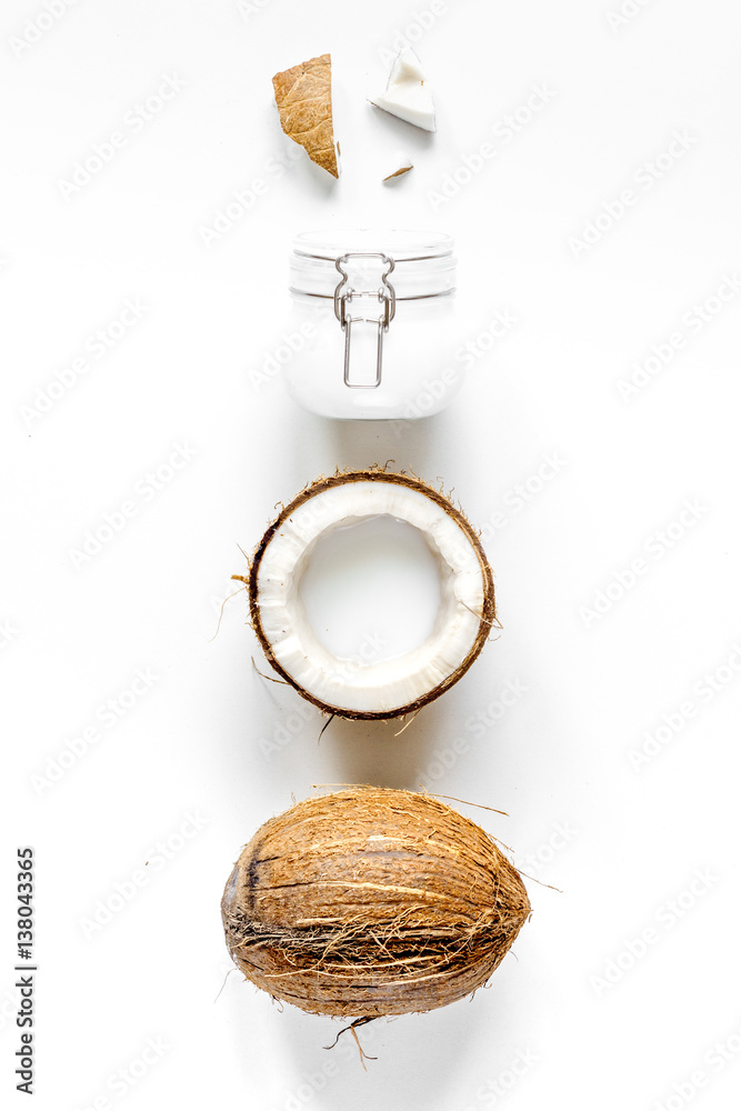 organic cosmetics with coconut on white background top view